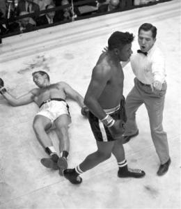 Ingemar Johansson lies on the canvas after challenger Floyd Patterson flattened him in the fifth round at the Polo Grounds in New York on June 20, 1960. With the knockout, Patterson regained the heavyweight championship. (Source: Boxnews.com) Copyright: Associated Press